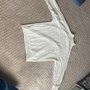 White medium sized turtle neck sweater.